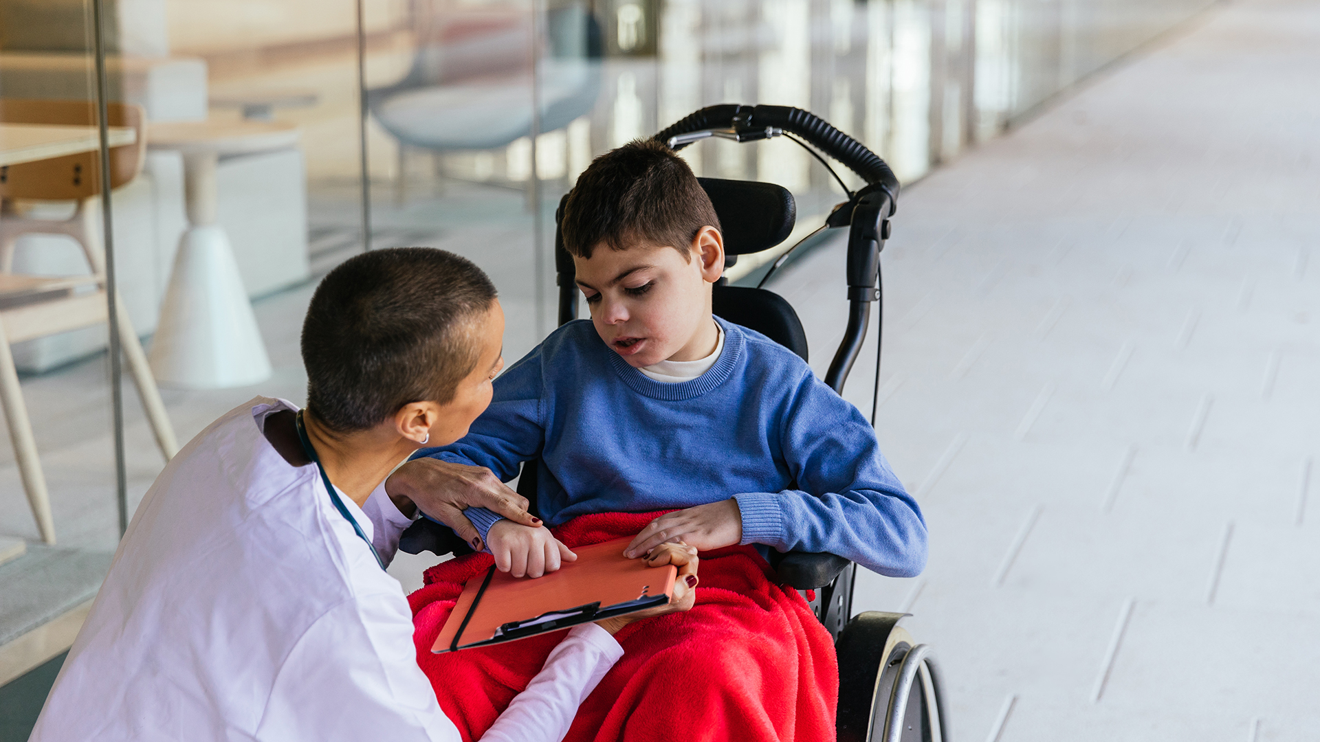 Nurse taking care of a special needs child