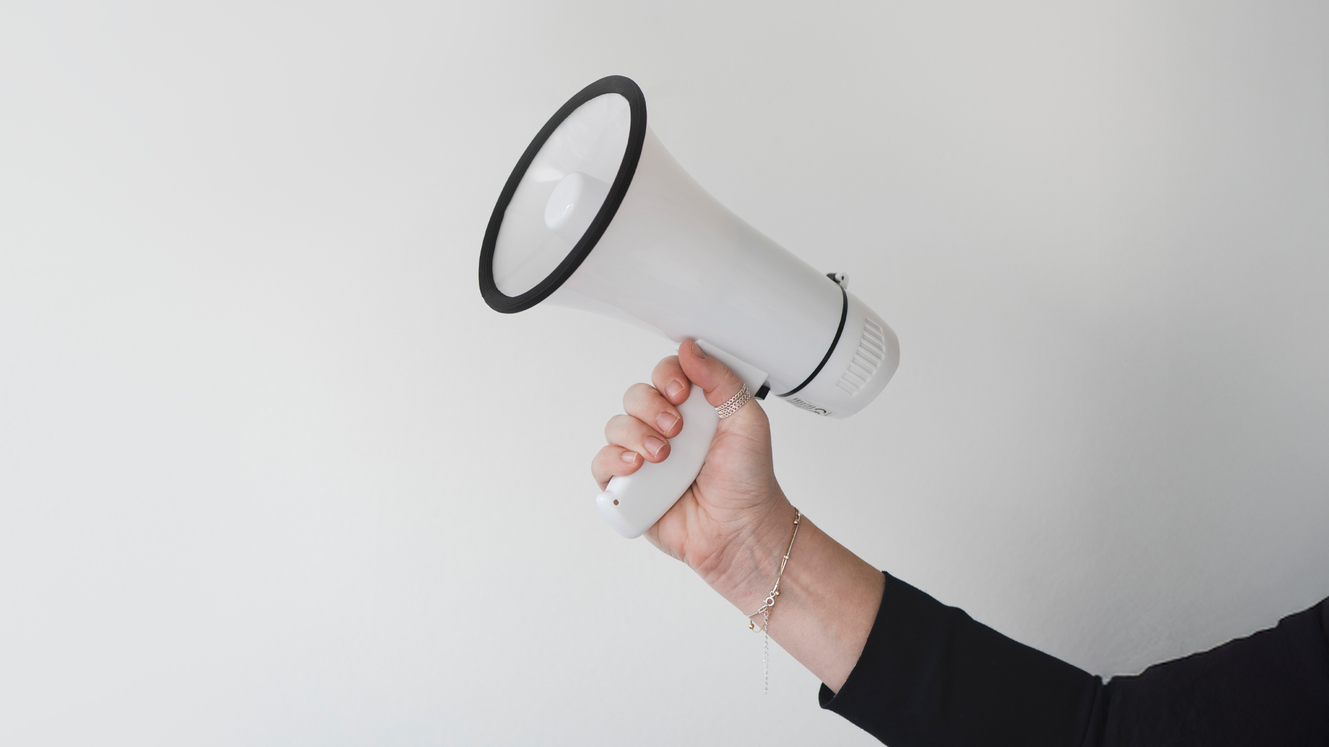 hand holding a megaphone