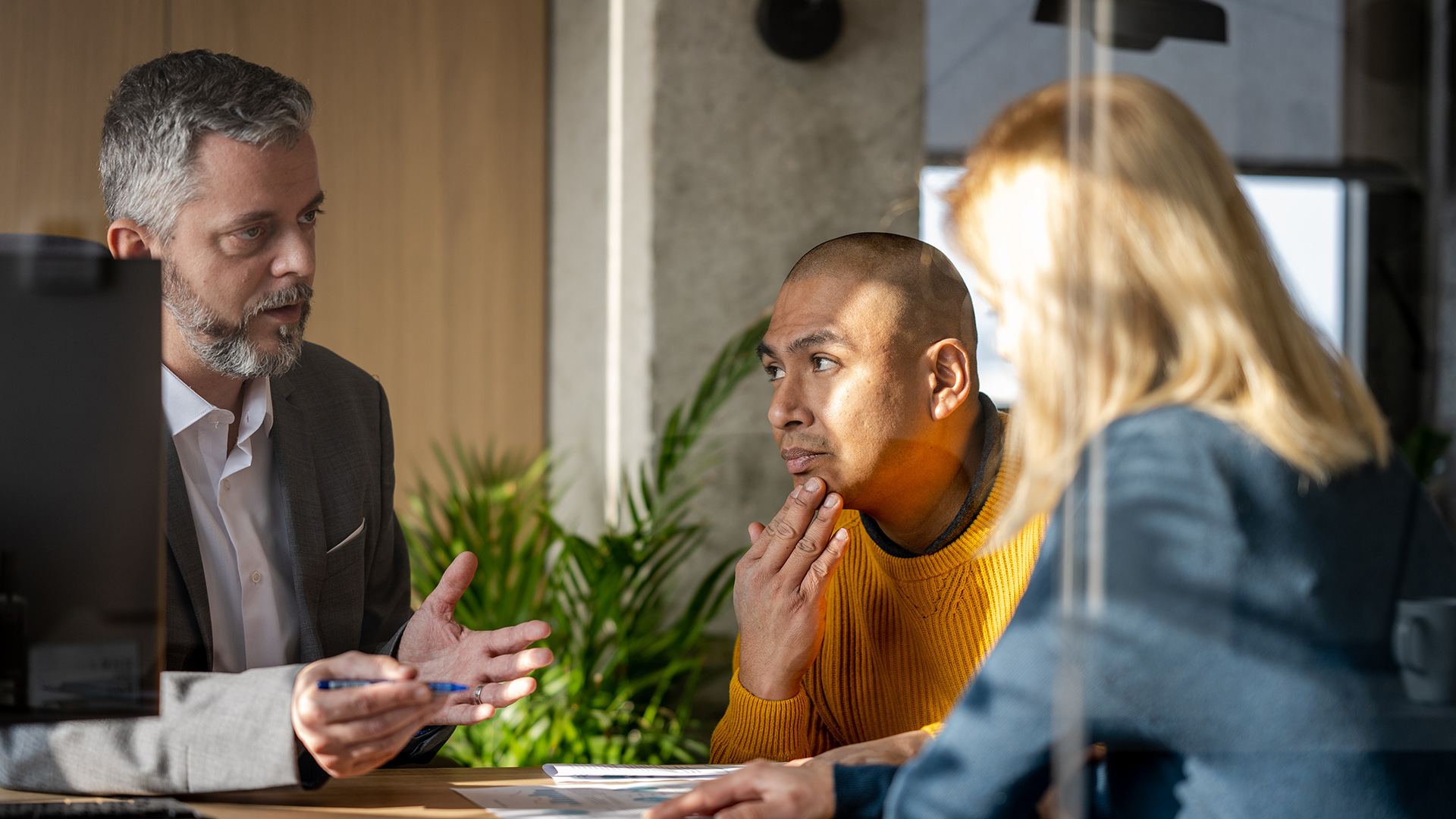 Financial advisor speaking with his client