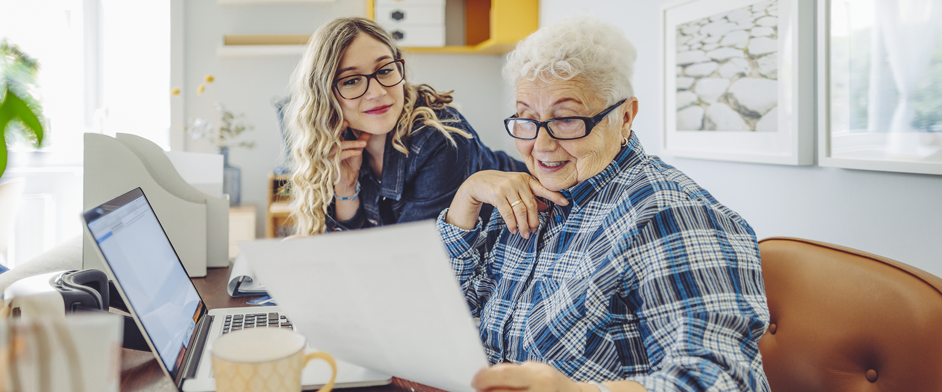 Financial advisor working with client at home