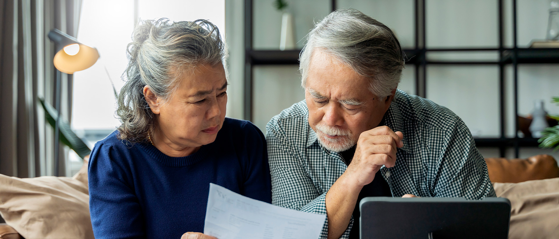 An elderly couple considering their retirement future