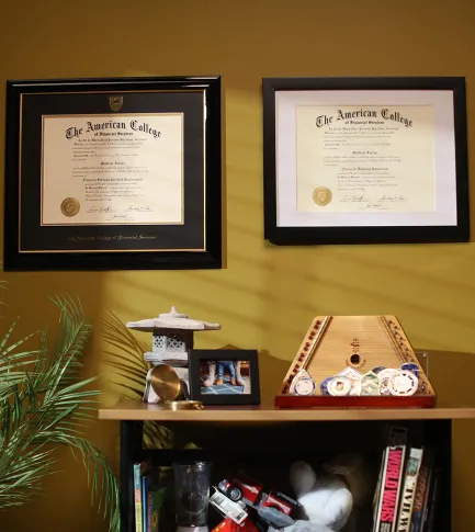 Diplomas on the wall in the office