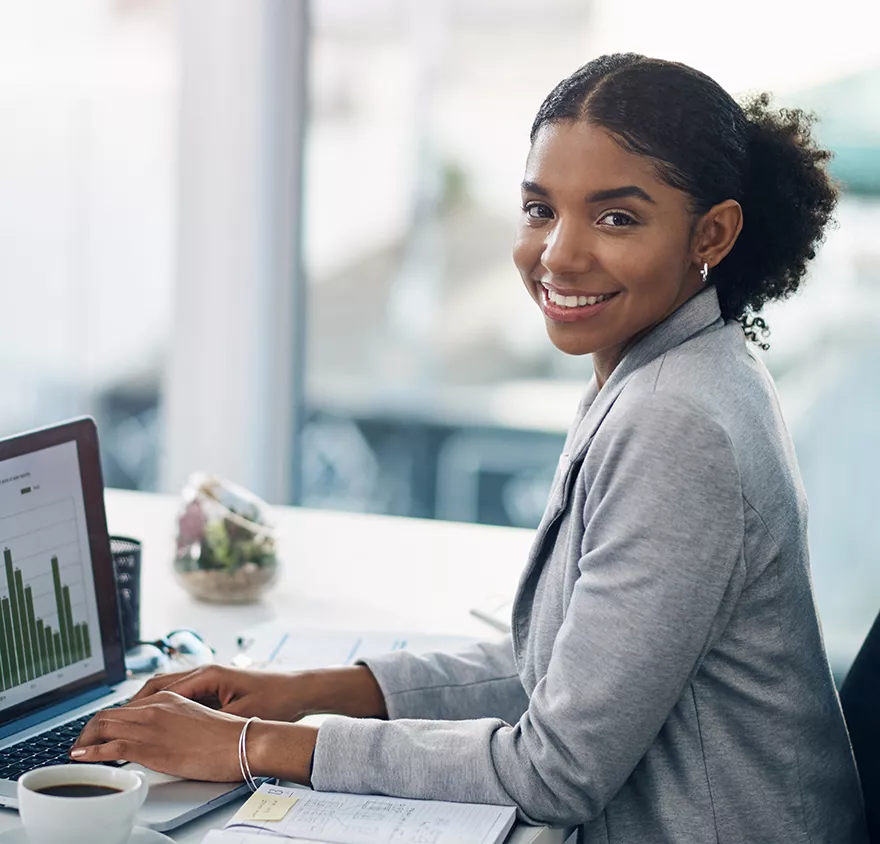 Woman sitting at a laptop