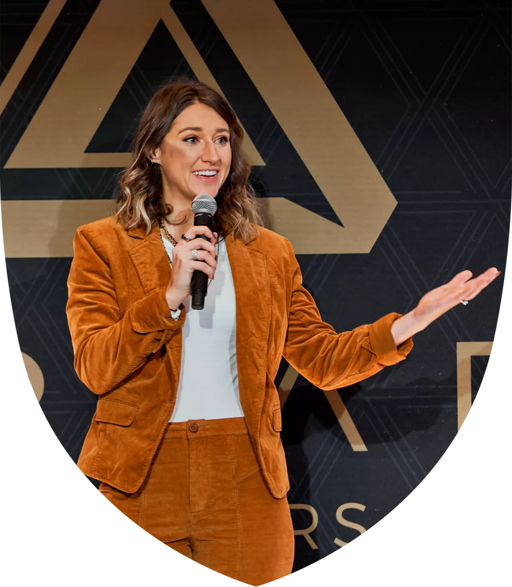 Image of a woman speaking to a crowd