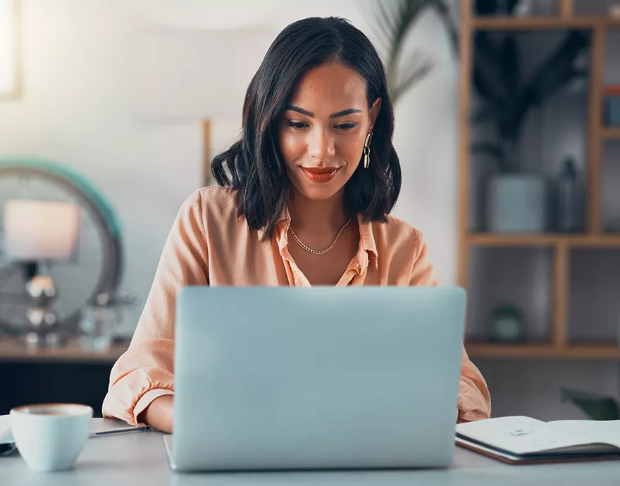 Woman working at a laptop