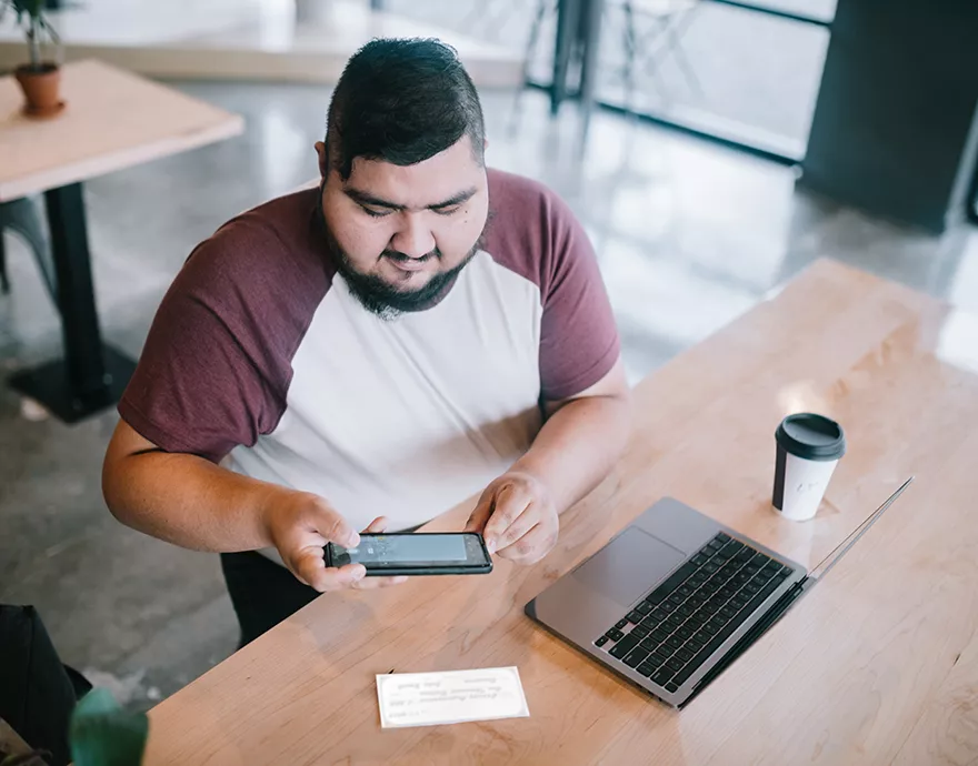 Man sitting at a laptop