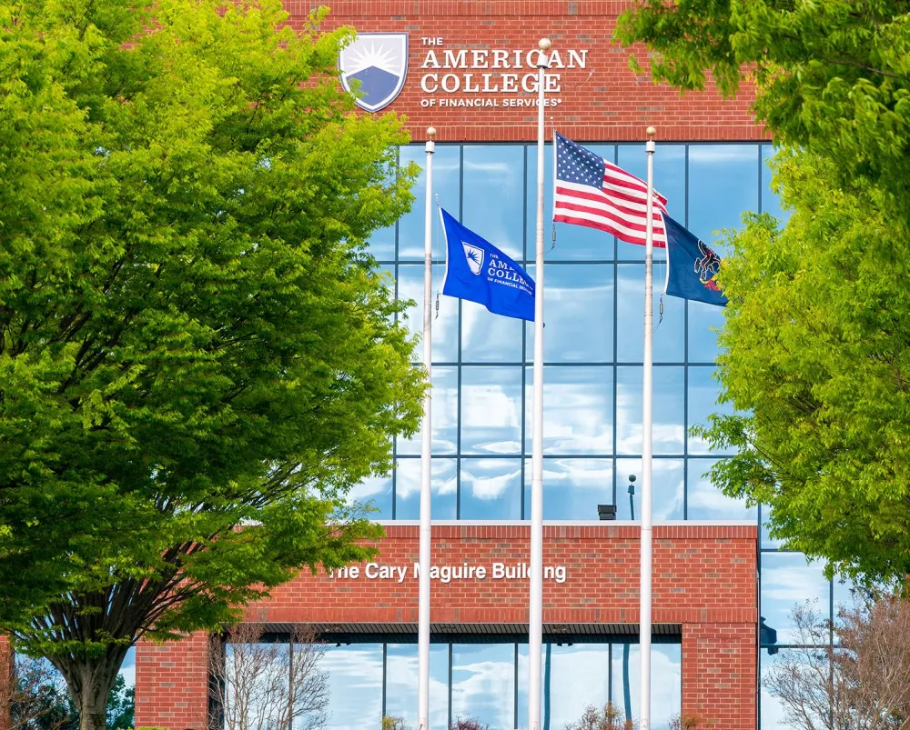 The college building with three flags in front 