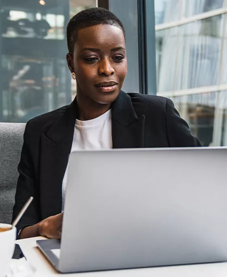 Woman sitting at a laptop