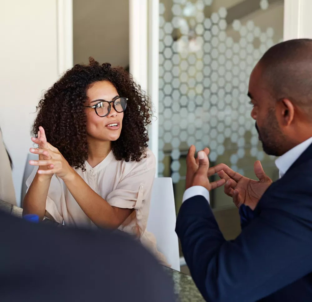 A woman and a man talking