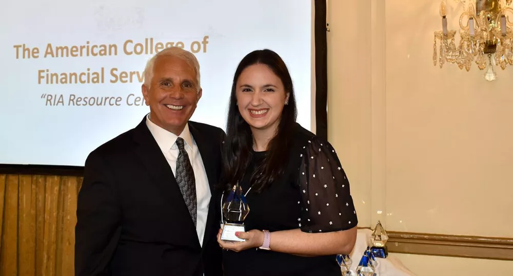 Two attendees from the award event