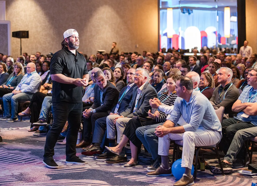 Speaker talking to attendees at Horizons 2025 conference