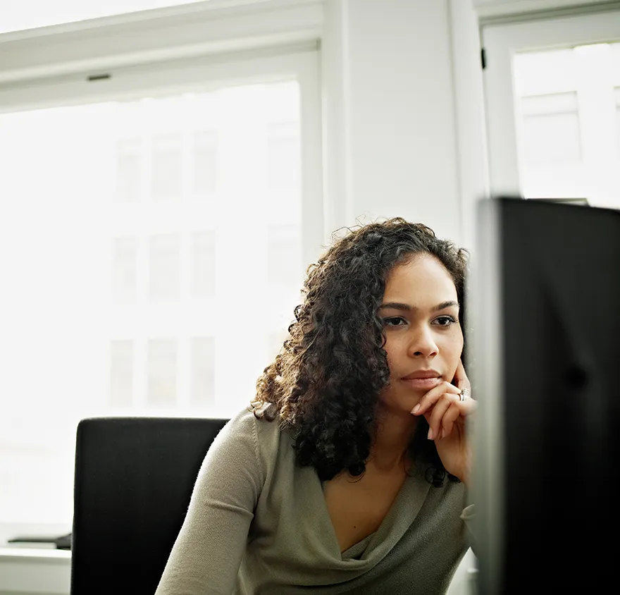 Woman studying on her computer