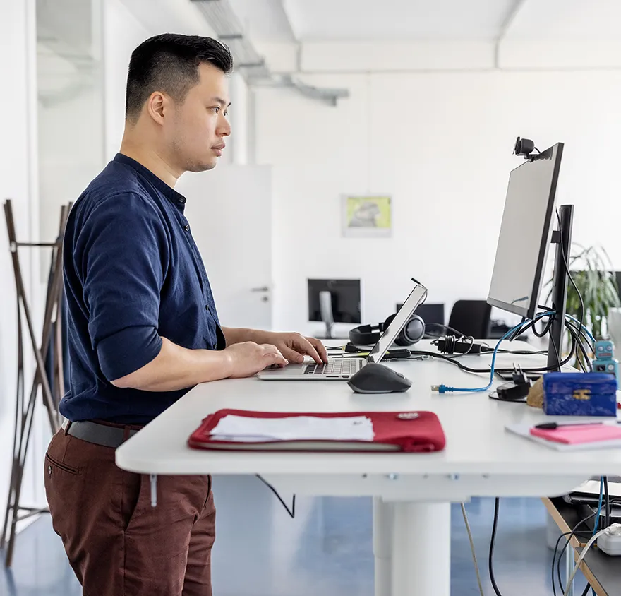 Man working at his standing desk