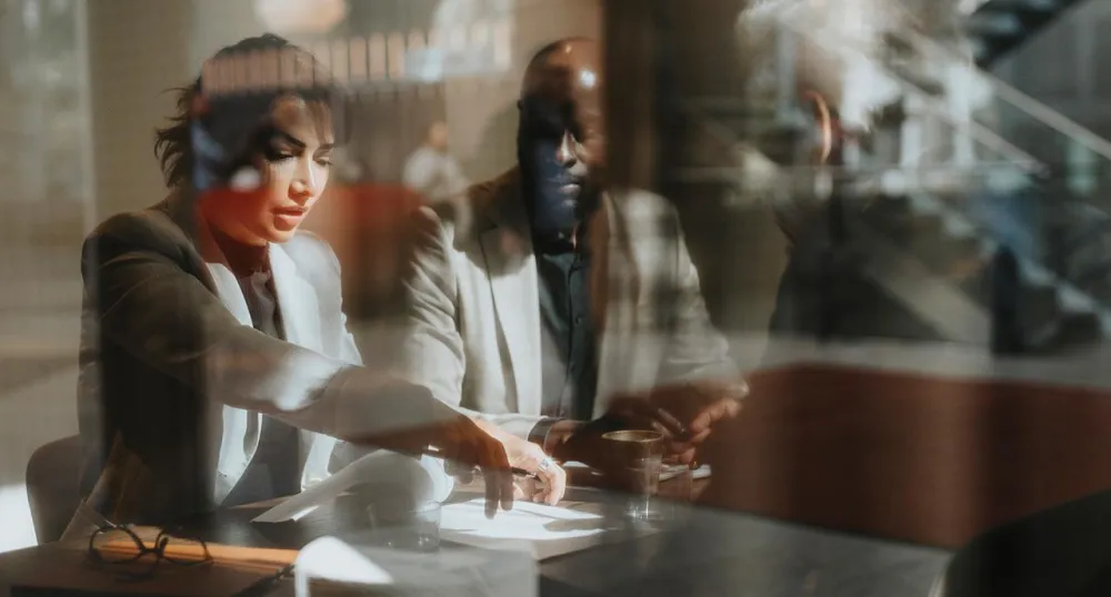 Financial advisor speaking with her client