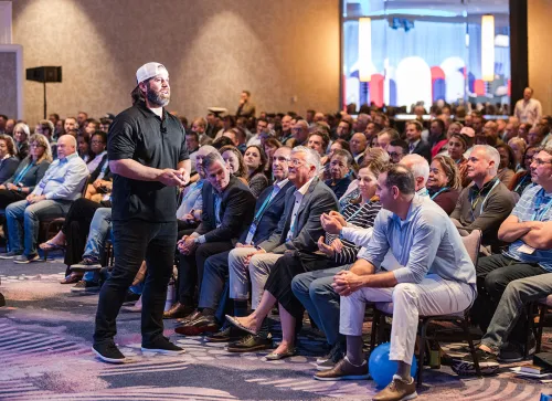 Speaker talking to attendees at Horizons 2025 conference