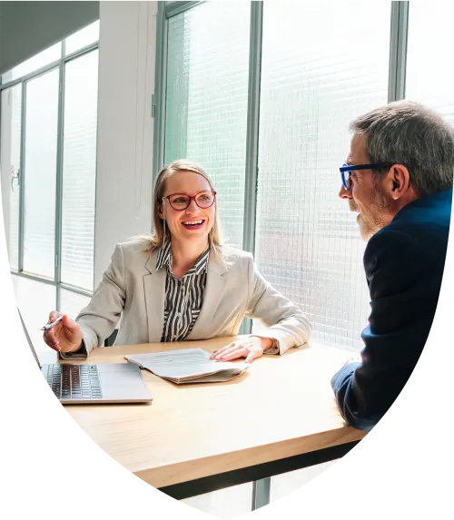 Female advisor speaking with her retirement age client