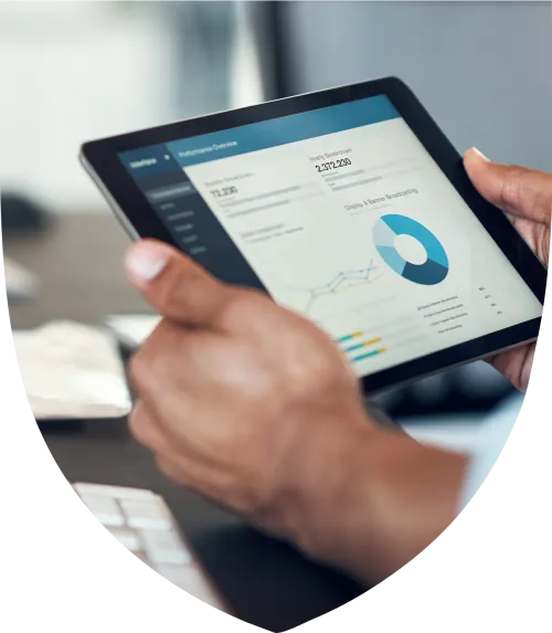 Person holding a tablet looking at stock portfolio