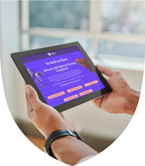 Man holding and looking at a tablet 