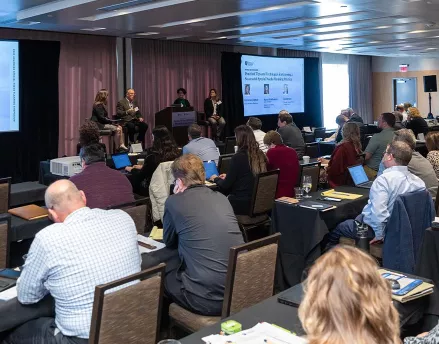 Attendees listening to a session at ASNP conference